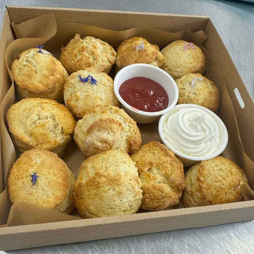 Mini scones with jam and cream