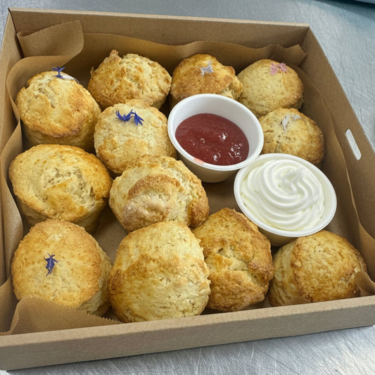 Mini scones with jam and cream