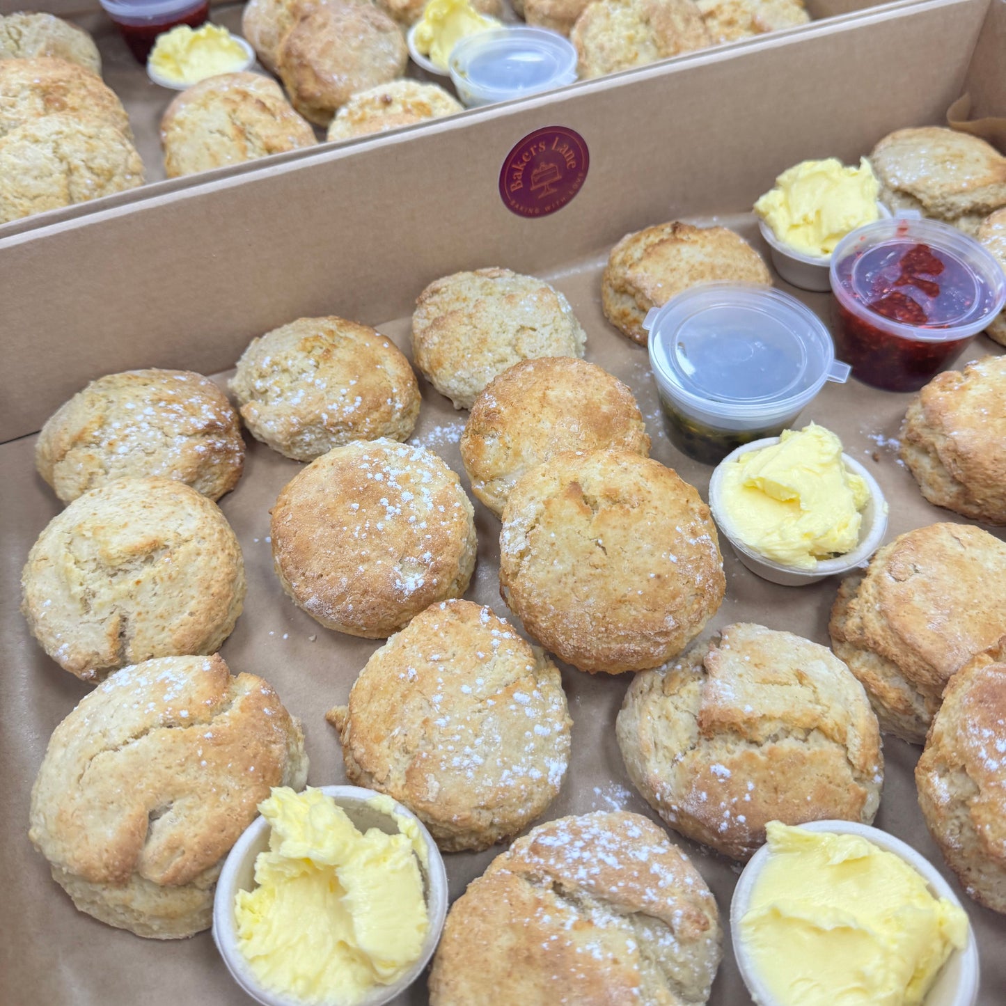 Mini scones with jam and cream